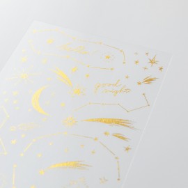 Metallic stickers in gold with a star motif.