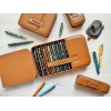 A pencil case made of brown leather that will display our pens beautifully.