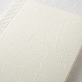 Minimalist notebook with embossing on the cover.