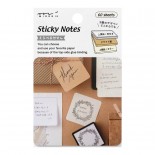 A set of sticky notes in three colors.