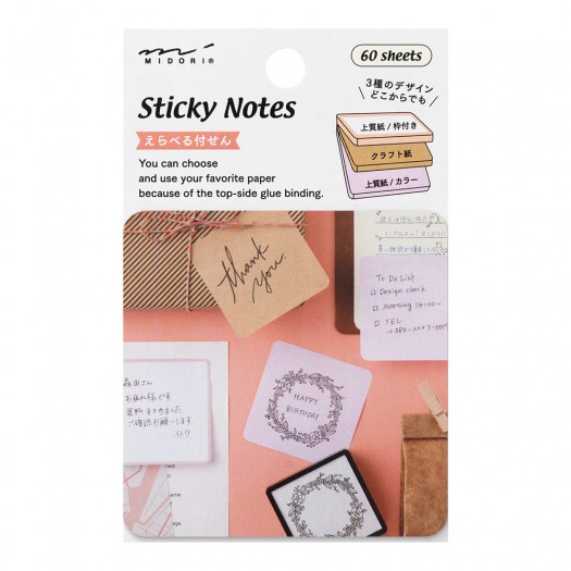 A set of sticky notes in three colors.