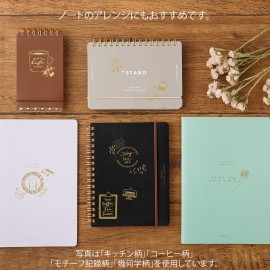 Notebooks with applied transfer stickers.