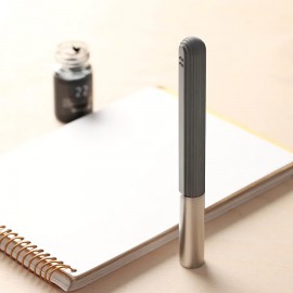A pen with a minimalist and modern design.