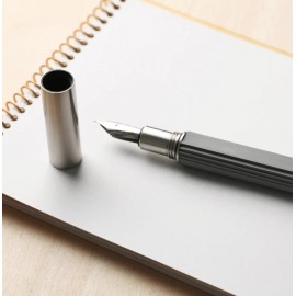 A pen with a minimalist and modern design.