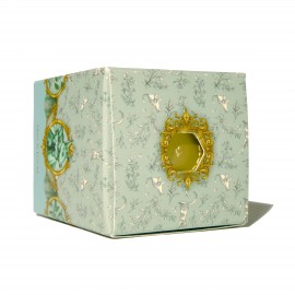 The ink is packaged in a decorative flacon and illustrated box.