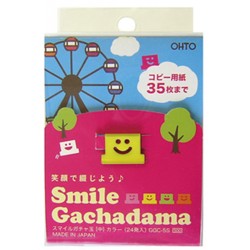 Non-invasive paper clip with smiley face motif.