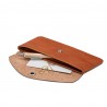 Leather pencil case with snap closure.